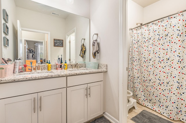 6531 Tulip Tree Dr, Murfreesboro, TN 37128 - full bath featuring double vanity, a shower with curtain, a bidet, and tile patterned flooring