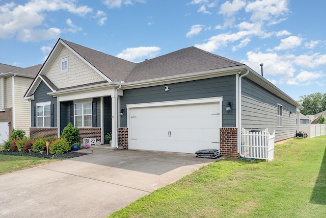 6531 Tulip Tree Dr, Murfreesboro, TN 37128 - view of front of property with brick siding, driveway, a garage, a front yard, and roof with shingles