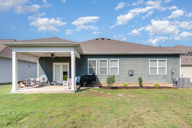 6531 Tulip Tree Dr, Murfreesboro, TN 37128 - back of property featuring a ceiling fan, a patio, a yard, and a shingled roof