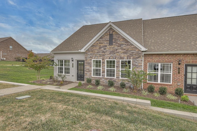 881 Meadowcrest Way, Lebanon, TN 37090 - view of front of property featuring a front yard, roof with shingles, stone siding, and brick siding