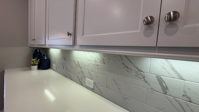 881 Meadowcrest Way, Lebanon, TN 37090 - detailed view of backsplash, white cabinetry, and light countertops