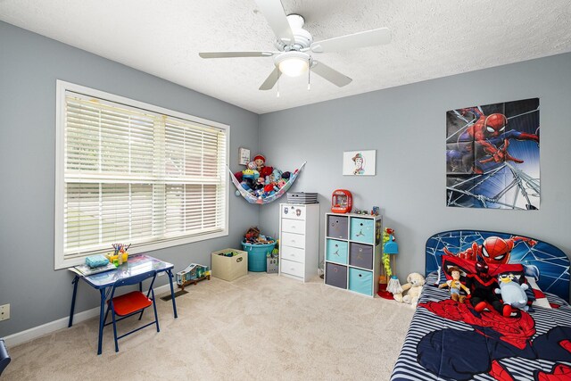 5026 Claude Dr, Smyrna, TN 37167 - bedroom featuring carpet floors, a ceiling fan, and a textured ceiling
