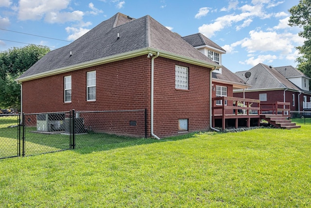 5026 Claude Dr, Smyrna, TN 37167 - view of home's exterior with brick siding, a shingled roof, a deck, and a gate