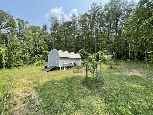 454 Slater Loop, Pikeville, TN 37367 - view of grassy yard featuring a wooded view