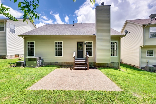 2210 Falcon Creek Dr, Franklin, TN 37067 - back of property with crawl space, a patio, a chimney, central air condition unit, and a lawn
