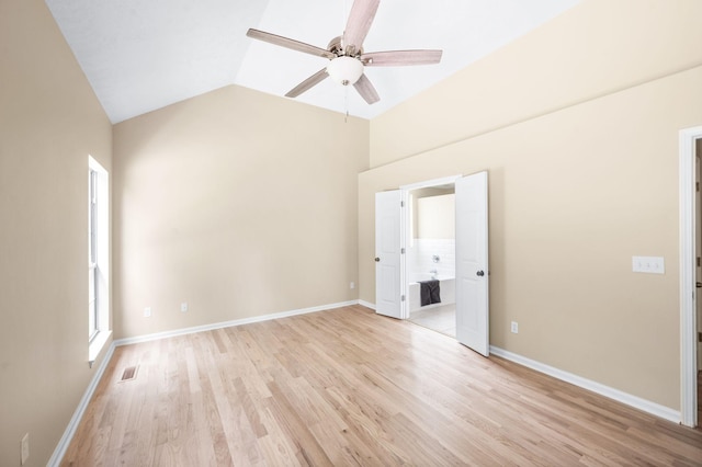 2210 Falcon Creek Dr, Franklin, TN 37067 - spare room featuring ceiling fan, vaulted ceiling, light wood-type flooring, and baseboards