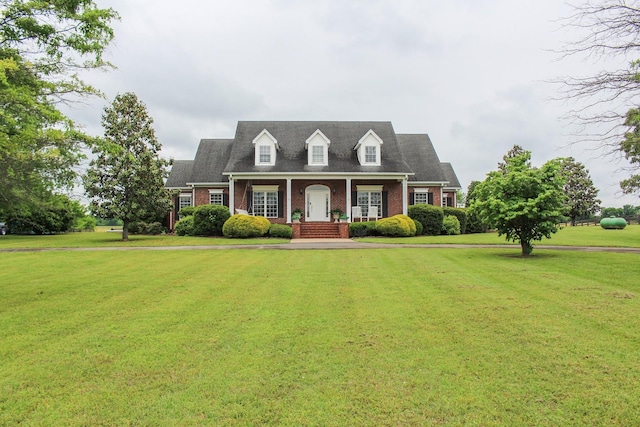 6464 Lebanon Rd, Murfreesboro, TN 37129 - new england style home featuring a front yard and brick siding