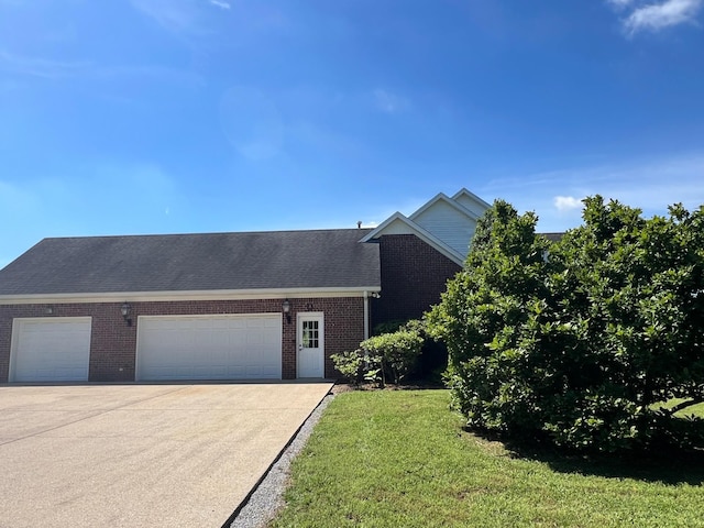 6464 Lebanon Rd, Murfreesboro, TN 37129 - view of front of house featuring brick siding, a garage, concrete driveway, and a front yard