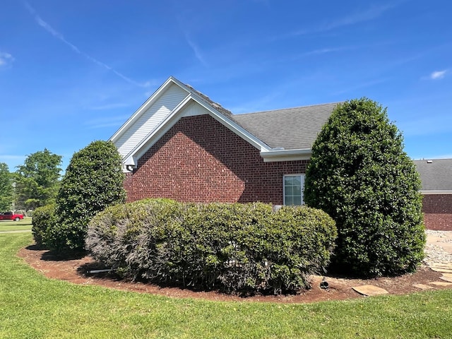 6464 Lebanon Rd, Murfreesboro, TN 37129 - view of side of home with brick siding and a lawn