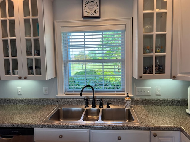 6464 Lebanon Rd, Murfreesboro, TN 37129 - kitchen featuring dishwasher, a sink, dark countertops, and glass insert cabinets