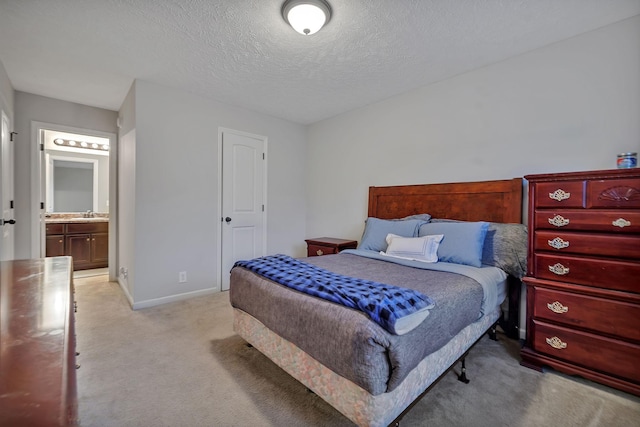 4822 Octavia St, Murfreesboro, TN 37129 - bedroom featuring light carpet, baseboards, a textured ceiling, and ensuite bathroom