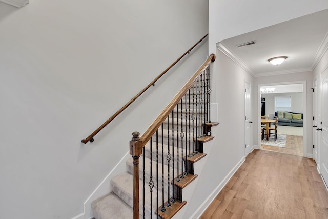 4822 Octavia St, Murfreesboro, TN 37129 - stairs featuring ornamental molding, wood finished floors, and baseboards