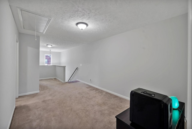4822 Octavia St, Murfreesboro, TN 37129 - empty room featuring attic access, a textured ceiling, carpet, and baseboards