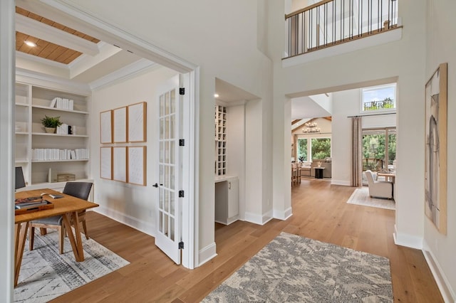 7271 Murrel Dr, Franklin, TN 37064 - home office featuring hardwood / wood-style floors, french doors, crown molding, beam ceiling, and baseboards