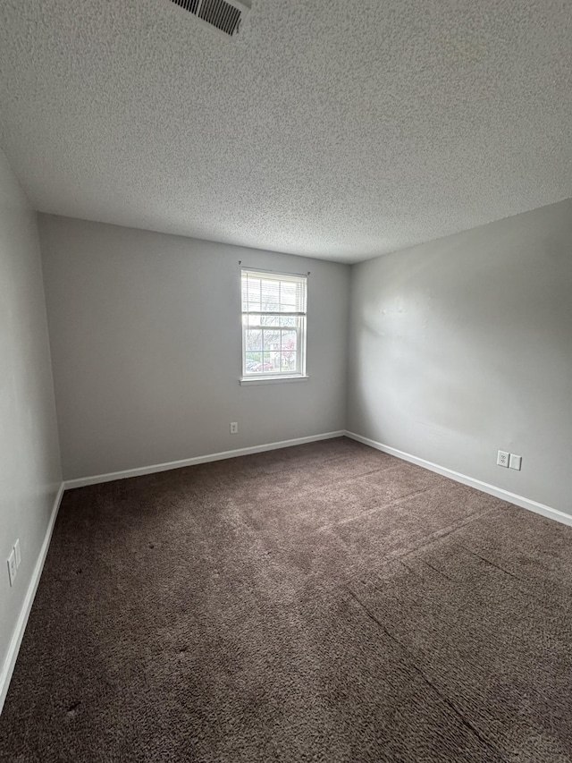 1301 Neelys Bend Rd Unit 43, Madison, TN 37115 - carpeted spare room with a textured ceiling and baseboards