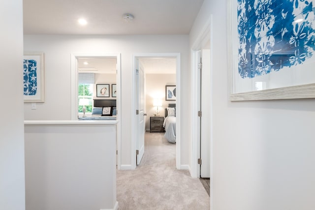 1680 Laurel St, Gallatin, TN 37066 - hallway featuring light colored carpet, baseboards, and recessed lighting