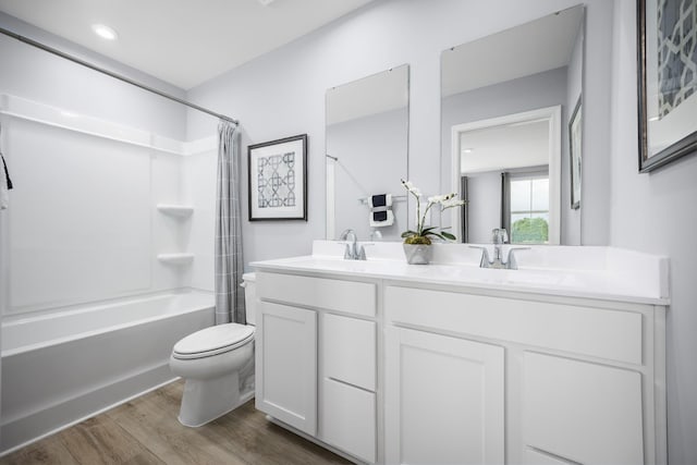 1680 Laurel St, Gallatin, TN 37066 - full bath featuring toilet, double vanity, wood finished floors, and shower / bath combination with curtain