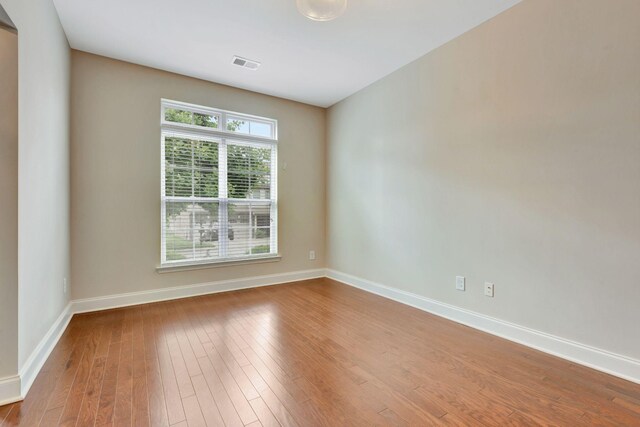 356 Irvine Ln, Franklin, TN 37064 - empty room with wood finished floors and baseboards