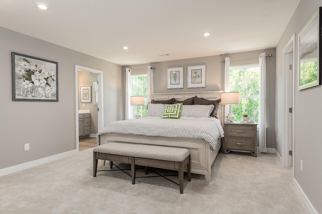 1171 Savannah Ave, Gallatin, TN 37066 - bedroom featuring light colored carpet, multiple windows, baseboards, and recessed lighting