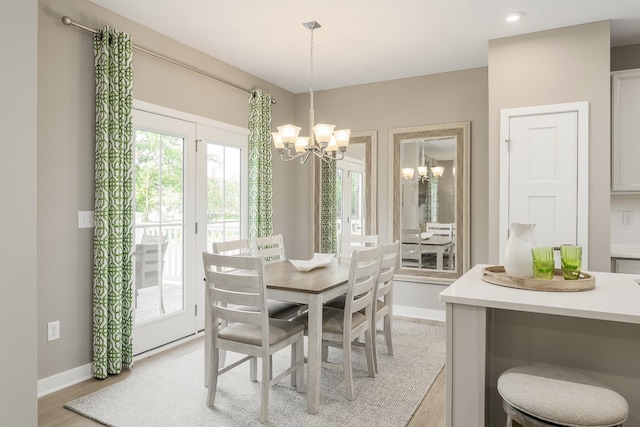 1171 Savannah Ave, Gallatin, TN 37066 - dining space featuring a chandelier, baseboards, light wood-type flooring, and recessed lighting