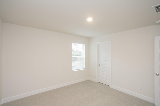 3013 Kemp Dr, Hermitage, TN 37076 - unfurnished room featuring light carpet, baseboards, recessed lighting, and a smoke detector