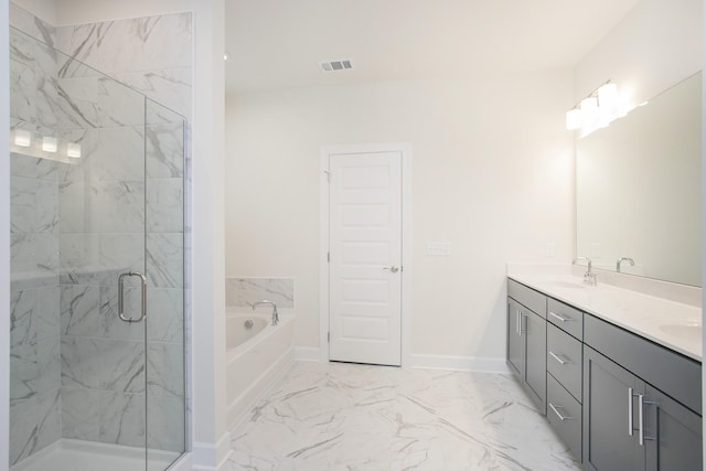 3013 Kemp Dr, Hermitage, TN 37076 - full bath featuring a bath, marble look tiles, a stall shower, double vanity, and baseboards