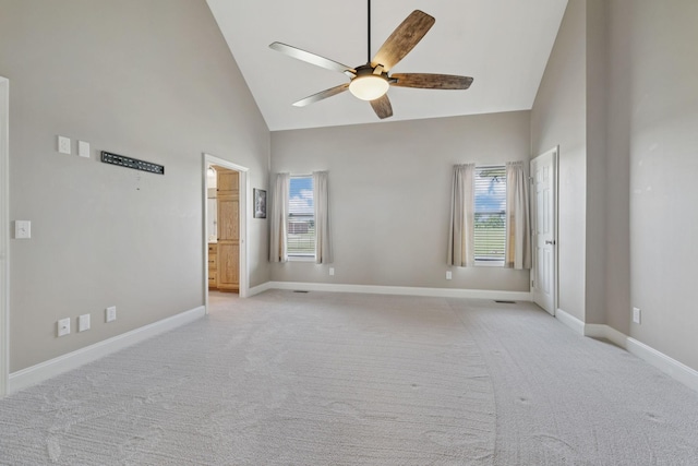 930 Eastover Rd, Lebanon, TN 37090 - spare room featuring a ceiling fan, light carpet, baseboards, and high vaulted ceiling
