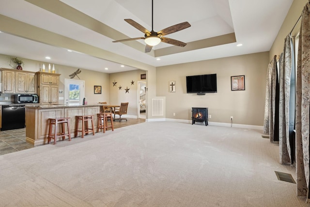 930 Eastover Rd, Lebanon, TN 37090 - kitchen featuring black appliances, recessed lighting, light colored carpet, a kitchen bar, and open floor plan