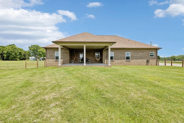 930 Eastover Rd, Lebanon, TN 37090 - rear view of property with a patio, brick siding, and roof with shingles
