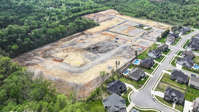3263 Kemp Dr, Hermitage, TN 37076 - aerial overview of property's location featuring a forest and nearby suburban area