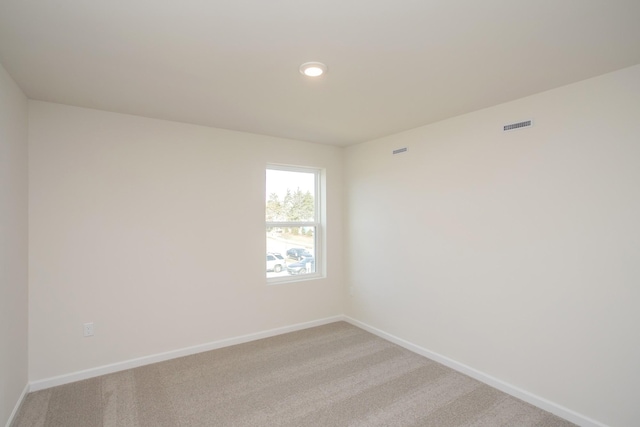 3263 Kemp Dr, Hermitage, TN 37076 - empty room with baseboards, light carpet, and recessed lighting