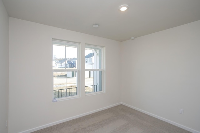3263 Kemp Dr, Hermitage, TN 37076 - unfurnished room with baseboards, light carpet, and recessed lighting
