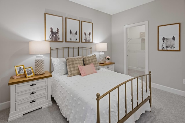 2521 Kingston Ct, Mount Juliet, TN 37122 - bedroom with carpet floors, baseboards, and a walk in closet