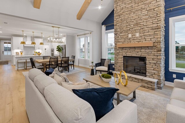 2521 Kingston Ct, Mount Juliet, TN 37122 - living area featuring plenty of natural light, light wood-type flooring, baseboards, high vaulted ceiling, and beam ceiling