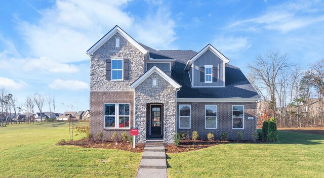 2521 Kingston Ct, Mount Juliet, TN 37122 - view of front of property featuring a front lawn, stone siding, and brick siding