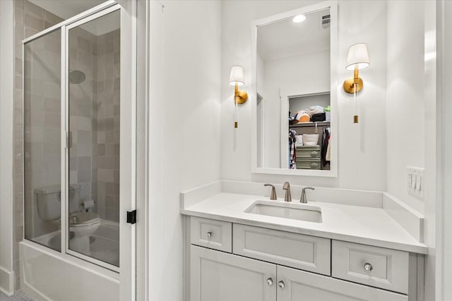 1750 Barrow Ln, Brentwood, TN 37027 - full bathroom featuring vanity, bath / shower combo with glass door, and a spacious closet