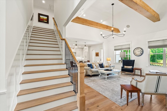 1750 Barrow Ln, Brentwood, TN 37027 - stairs with beam ceiling, a chandelier, wood finished floors, recessed lighting, and high vaulted ceiling