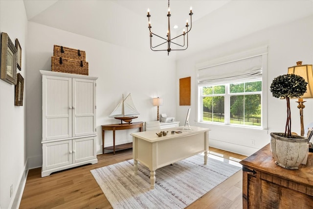 1750 Barrow Ln, Brentwood, TN 37027 - office featuring a chandelier, light wood-type flooring, and baseboards