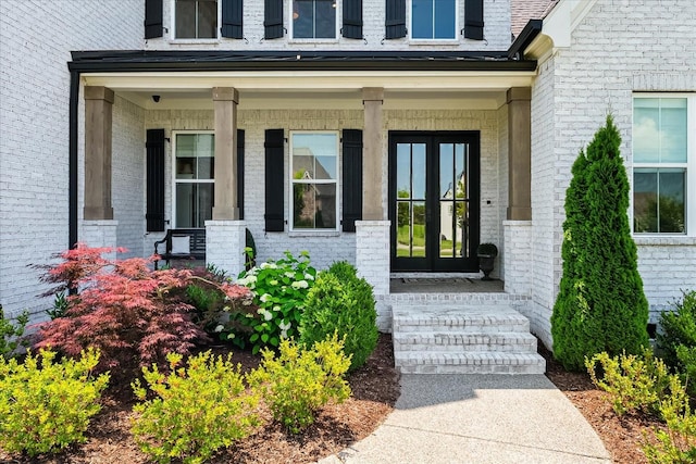 1750 Barrow Ln, Brentwood, TN 37027 - view of exterior entry featuring a porch and brick siding