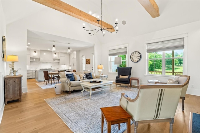 1750 Barrow Ln, Brentwood, TN 37027 - living area featuring beamed ceiling, a chandelier, light wood finished floors, recessed lighting, and high vaulted ceiling