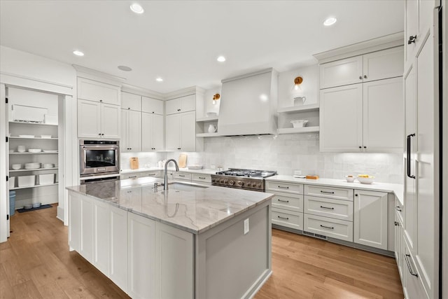 1750 Barrow Ln, Brentwood, TN 37027 - kitchen with a sink, open shelves, double oven, custom exhaust hood, and light wood-style flooring