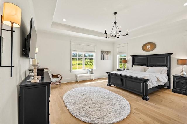 1750 Barrow Ln, Brentwood, TN 37027 - bedroom featuring a raised ceiling, a chandelier, light wood-type flooring, ornamental molding, and baseboards
