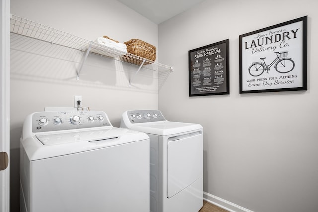 1553 Thornton Grove Blvd, Nashville, TN 37207 - laundry room with independent washer and dryer, baseboards, and wood finished floors