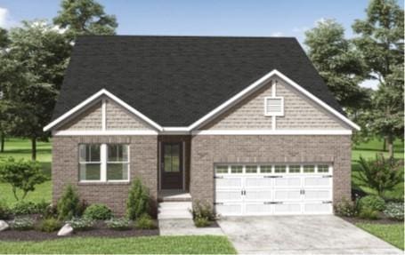 1005 Cherry Tree Dr, Mount Juliet, TN 37122 - view of front of property with concrete driveway, an attached garage, and brick siding