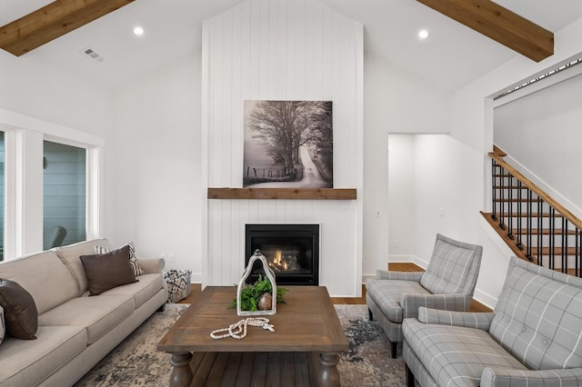 1005 Cherry Tree Dr, Mount Juliet, TN 37122 - living room featuring recessed lighting, a fireplace, beam ceiling, wood finished floors, and high vaulted ceiling