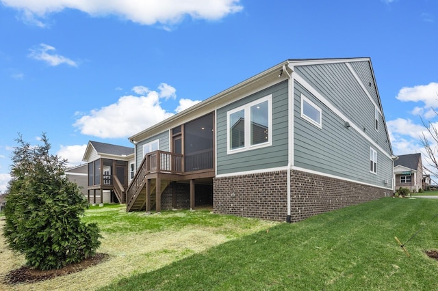 1005 Cherry Tree Dr, Mount Juliet, TN 37122 - rear view of property with a sunroom, stairway, a lawn, brick siding, and a wooden deck