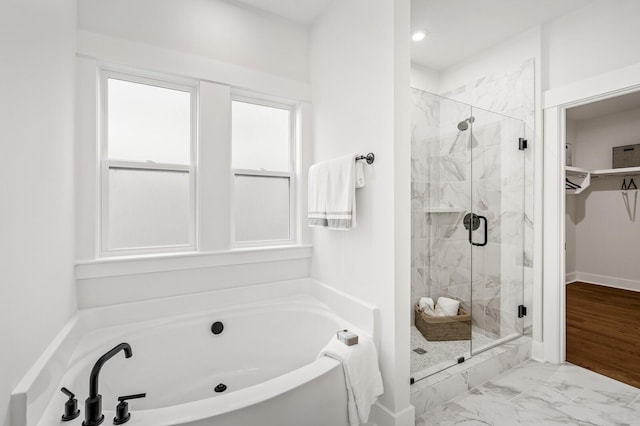1005 Cherry Tree Dr, Mount Juliet, TN 37122 - bathroom with a marble finish shower, a bath, a spacious closet, and marble finish flooring