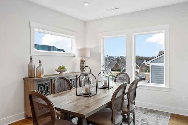 1005 Cherry Tree Dr, Mount Juliet, TN 37122 - dining area with baseboards, wood finished floors, and recessed lighting
