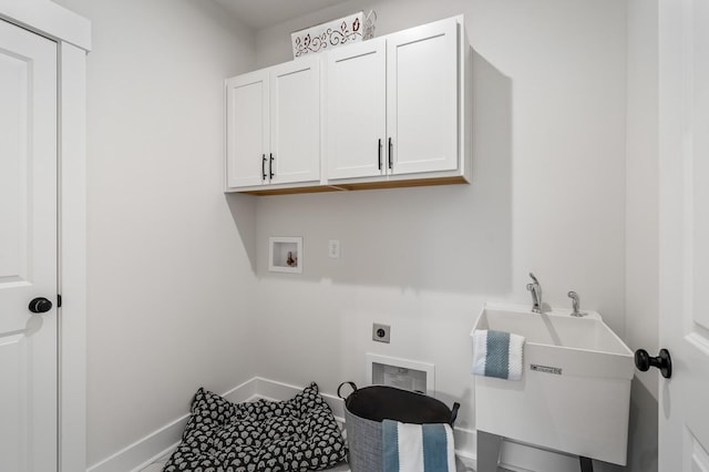 1005 Cherry Tree Dr, Mount Juliet, TN 37122 - laundry area featuring cabinet space, electric dryer hookup, hookup for a washing machine, and baseboards