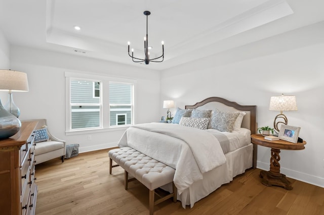 1005 Cherry Tree Dr, Mount Juliet, TN 37122 - bedroom with a raised ceiling, a chandelier, light wood-type flooring, baseboards, and recessed lighting